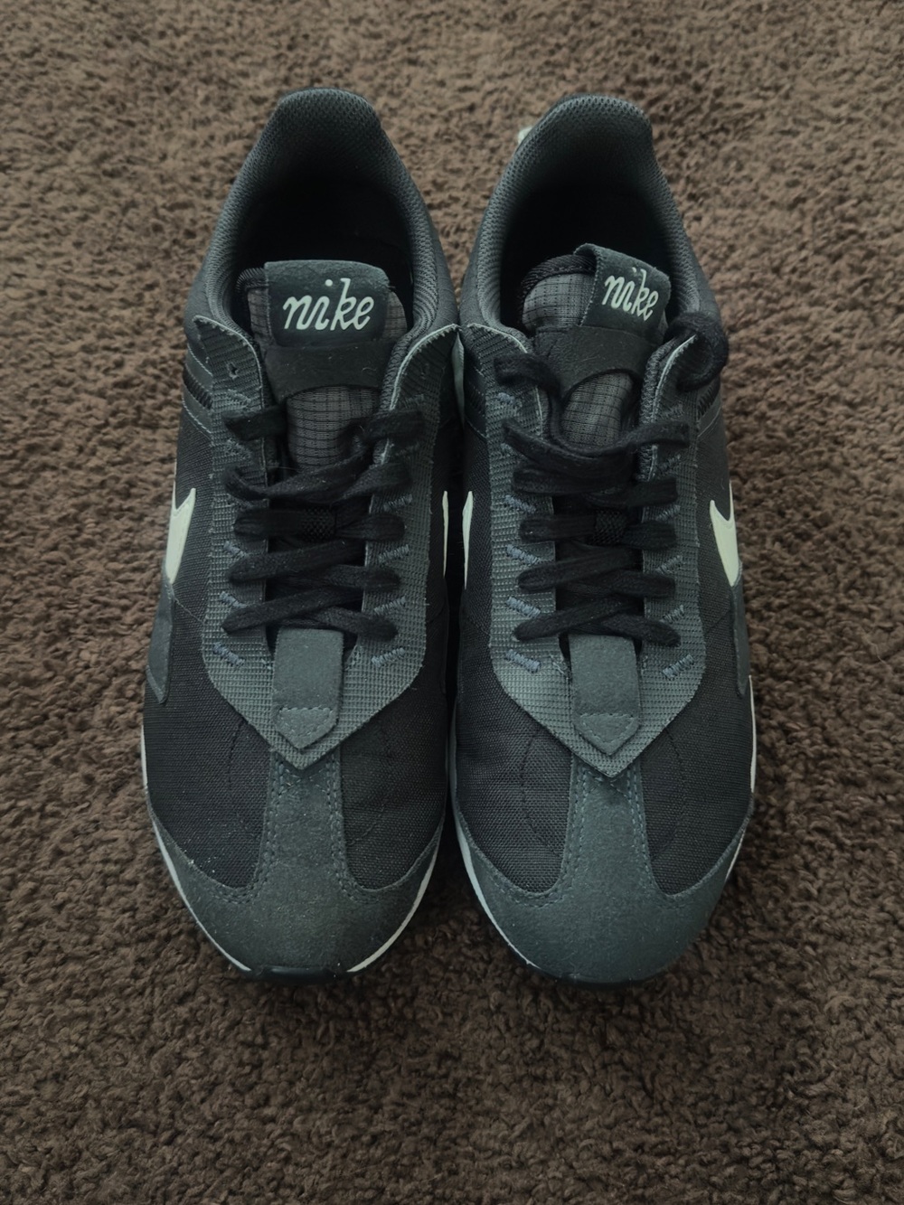 Nike Black and Gray Low-Profile Sneakers with White Swoosh